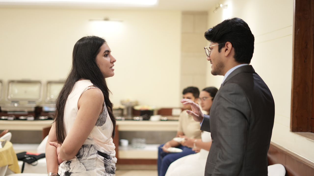 Two professionals discussing strategy and business decisions
