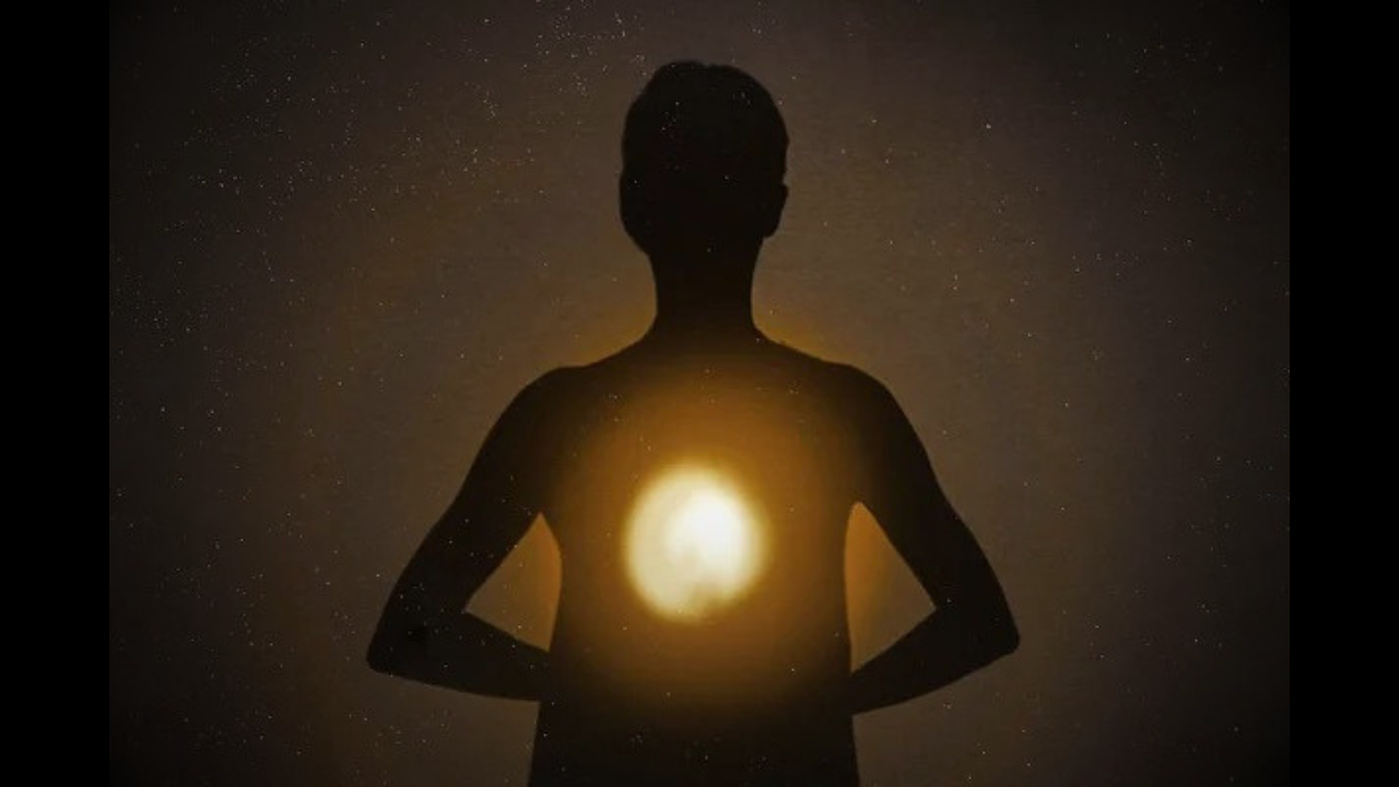 Person illuminated from within, symbolising inner purpose and identity